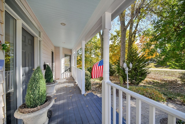 wooden deck featuring a porch