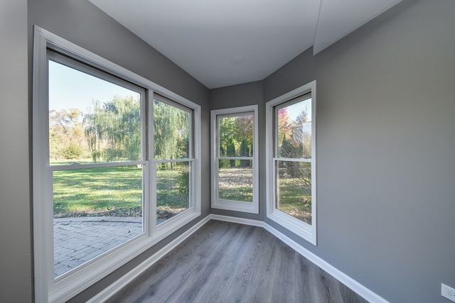 unfurnished sunroom with a wealth of natural light