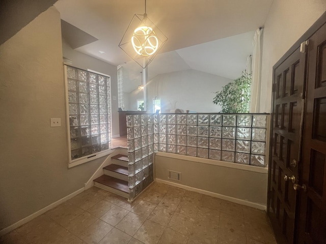 1817 E 171st Pl, South Holland, IL 60473 - stairs with vaulted ceiling, baseboards, a chandelier, and tile patterned floors