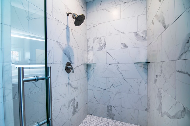 bathroom featuring an enclosed shower