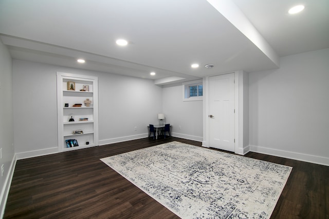 interior space with built in features and dark hardwood / wood-style flooring