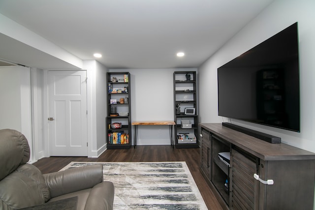 living room with dark hardwood / wood-style floors