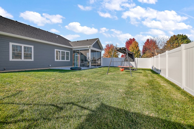 view of yard with a patio area and a sunroom