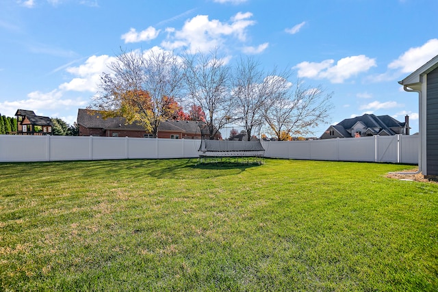 view of yard featuring a trampoline