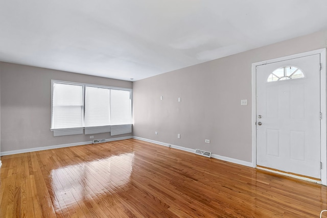 foyer with hardwood / wood-style floors