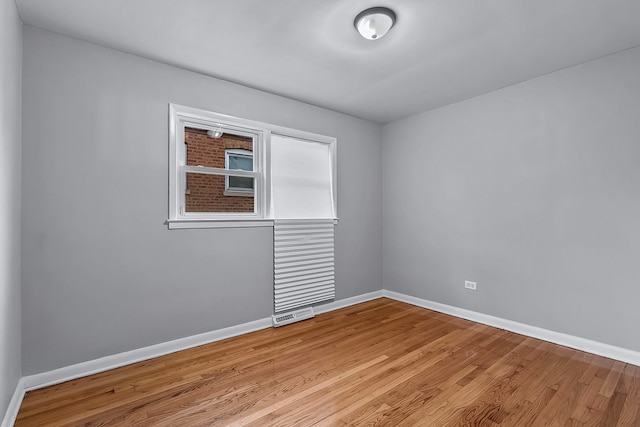 empty room featuring light hardwood / wood-style floors