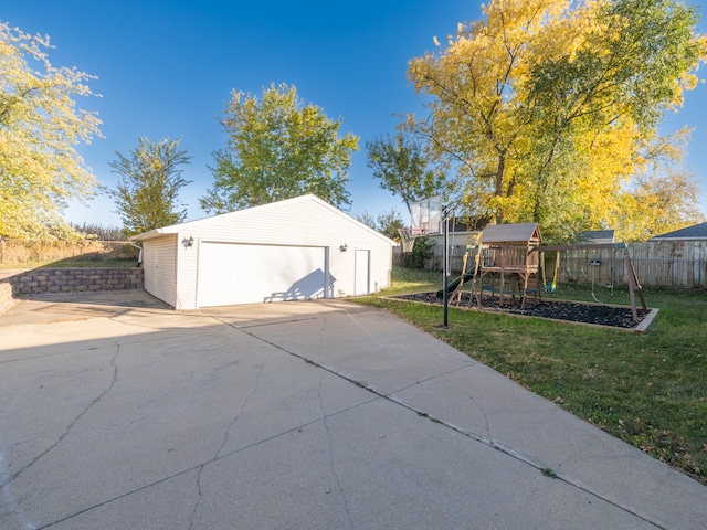 garage with a lawn