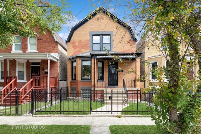 view of front of home featuring a porch and a front lawn