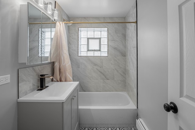 bathroom featuring vanity, decorative backsplash, shower / bath combination with curtain, and a baseboard radiator