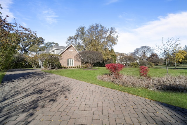 exterior space with a lawn