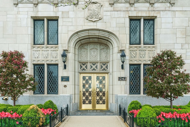 view of exterior entry featuring french doors