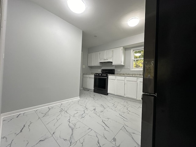 225 Pleasure Dr, Mundelein, IL 60060 - kitchen featuring baseboards, white cabinets, black appliances, marble finish floor, and under cabinet range hood