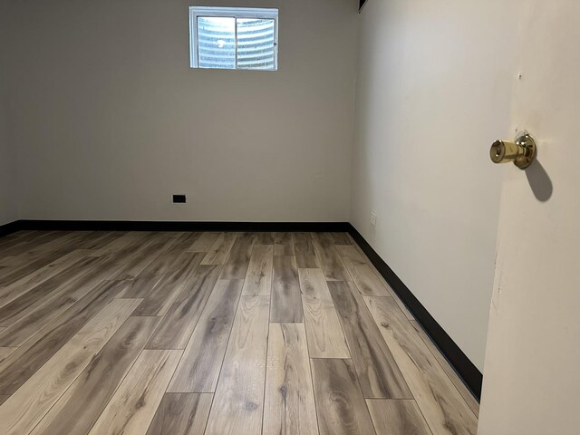 225 Pleasure Dr, Mundelein, IL 60060 - unfurnished room featuring baseboards and wood finished floors