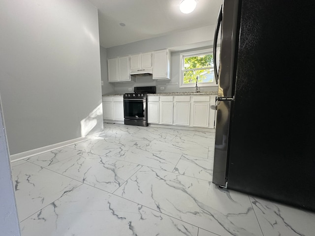 kitchen with white cabinets, black appliances, and sink