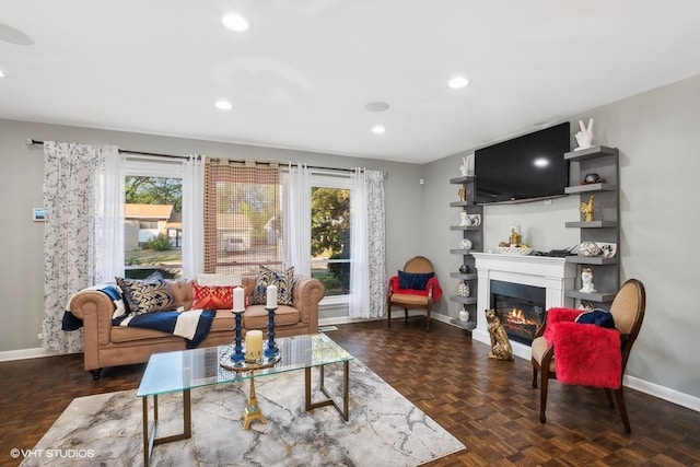 living room featuring dark parquet floors