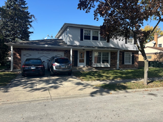 front facade with a front lawn and a garage