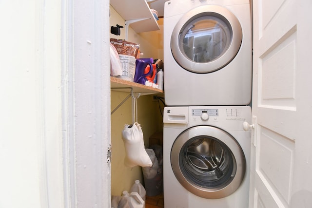 washroom with stacked washer / dryer