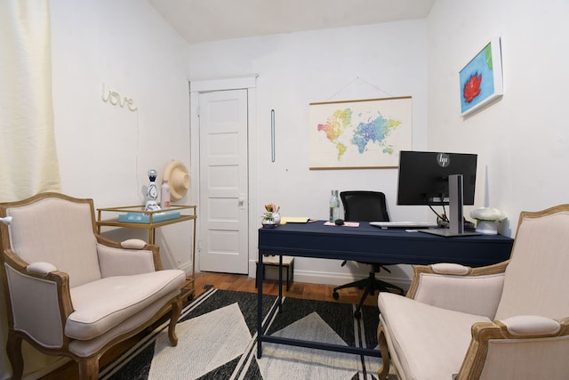 office area with wood-type flooring