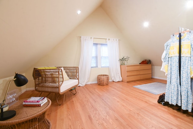 bonus room featuring hardwood / wood-style floors and lofted ceiling