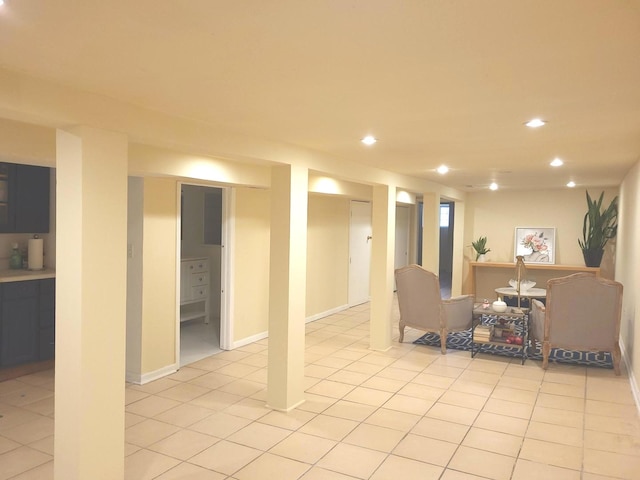 basement featuring light tile patterned flooring