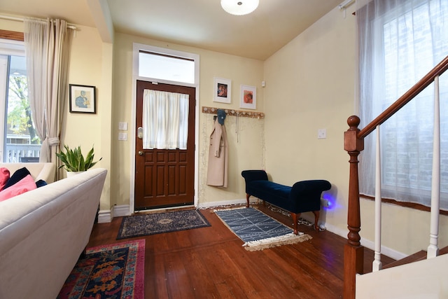 entryway with hardwood / wood-style flooring