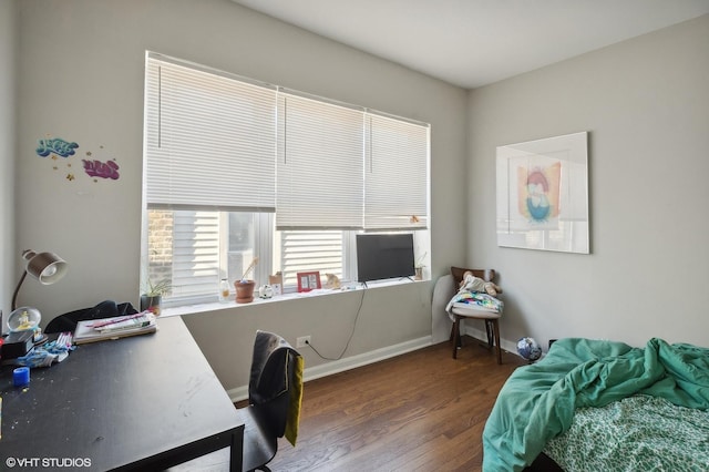 office with dark hardwood / wood-style flooring