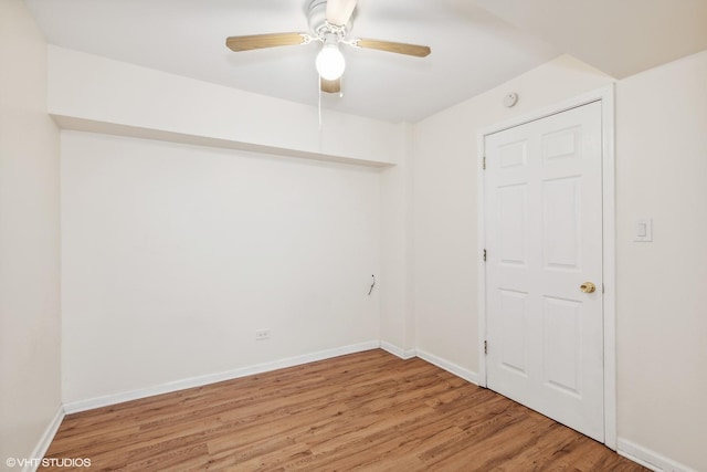 unfurnished room featuring ceiling fan and light hardwood / wood-style floors