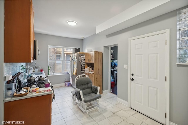 interior space with light tile patterned flooring