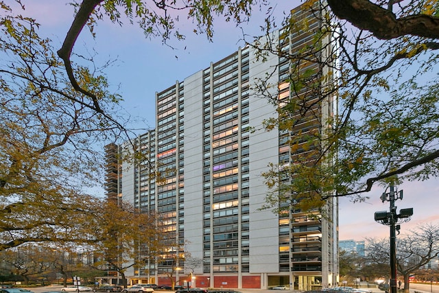 view of outdoor building at dusk