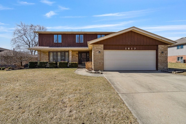 1617 Cimarron Dr, New Lenox, IL 60451 - view of front of house with driveway, a garage, a front yard, and brick siding