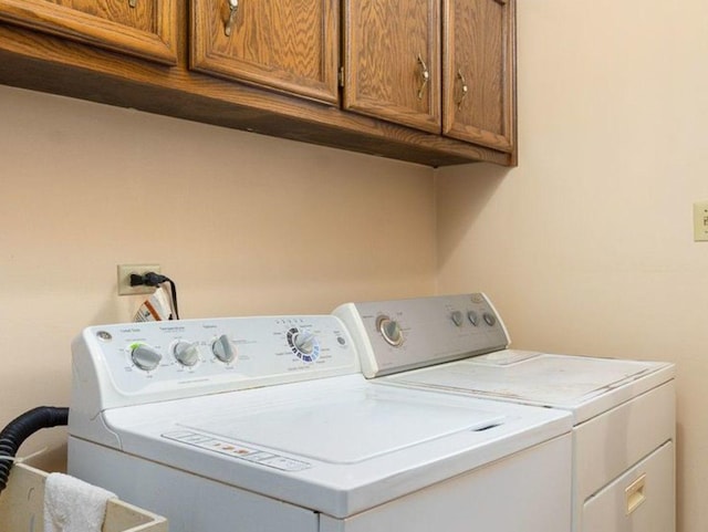 1617 Cimarron Dr, New Lenox, IL 60451 - laundry area with cabinet space and separate washer and dryer