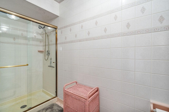 1617 Cimarron Dr, New Lenox, IL 60451 - bathroom featuring tile walls and a stall shower