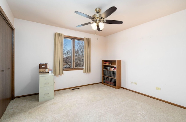 1617 Cimarron Dr, New Lenox, IL 60451 - unfurnished bedroom with a closet, light carpet, and ceiling fan