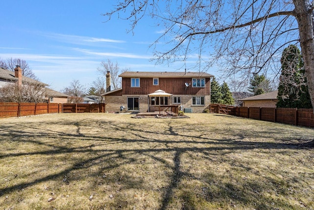 1617 Cimarron Dr, New Lenox, IL 60451 - rear view of house featuring a fenced backyard and brick siding