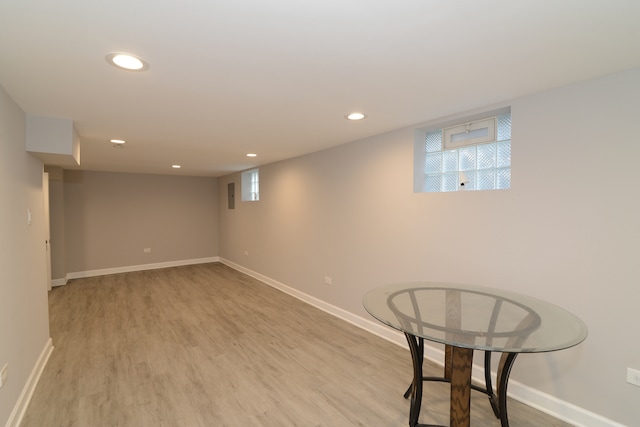 basement with light wood-type flooring