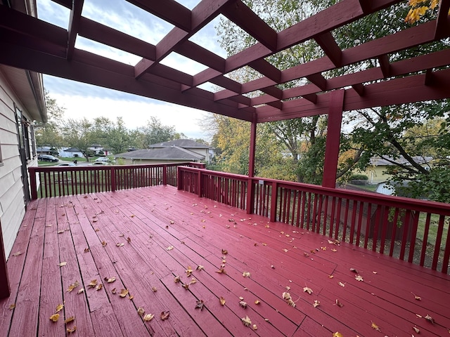 wooden deck featuring a pergola