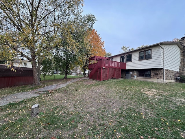 view of yard with a wooden deck