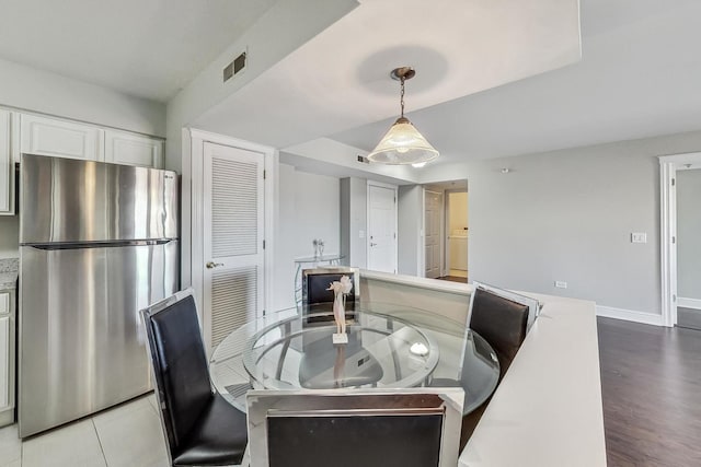 dining area featuring light hardwood / wood-style floors