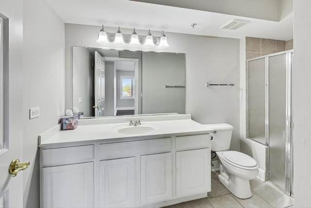 full bathroom with vanity, bath / shower combo with glass door, toilet, and tile patterned floors