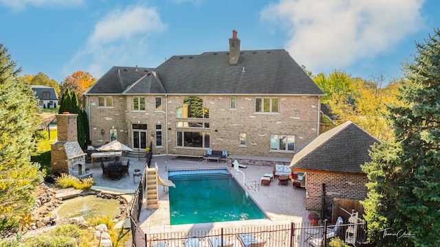 back of house with a patio area