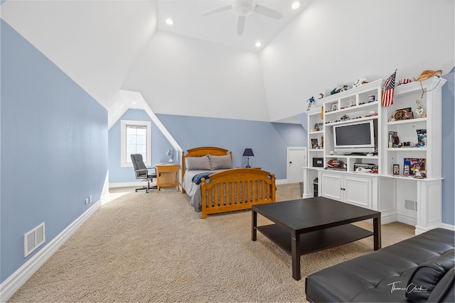 carpeted bedroom featuring lofted ceiling and ceiling fan