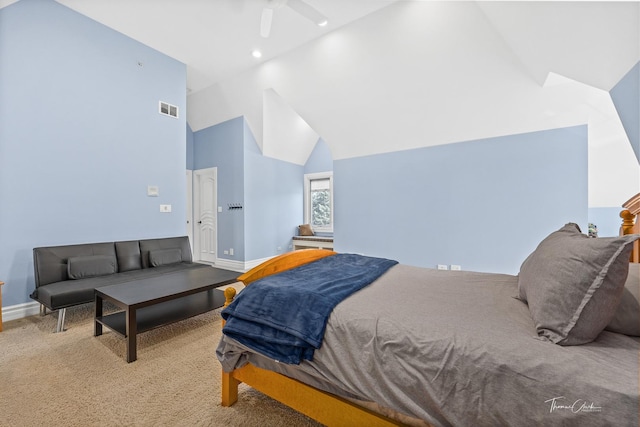 bedroom featuring light carpet, high vaulted ceiling, and ceiling fan