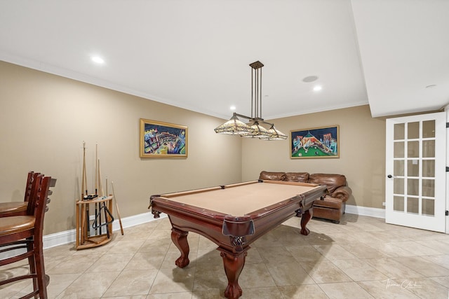 game room featuring crown molding, light tile patterned floors, and billiards