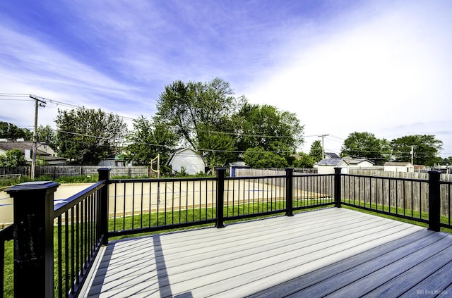 deck featuring a yard