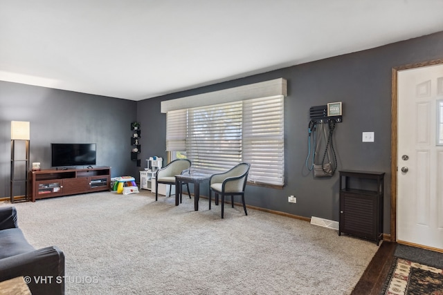 living room with light colored carpet