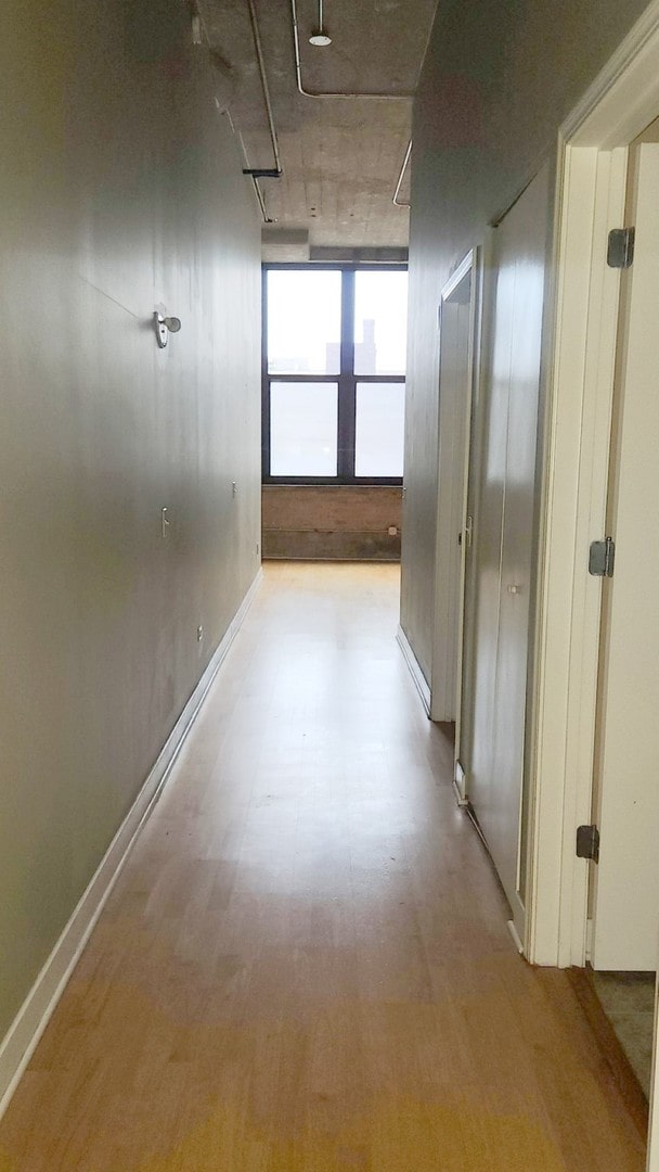 hallway featuring light wood-type flooring