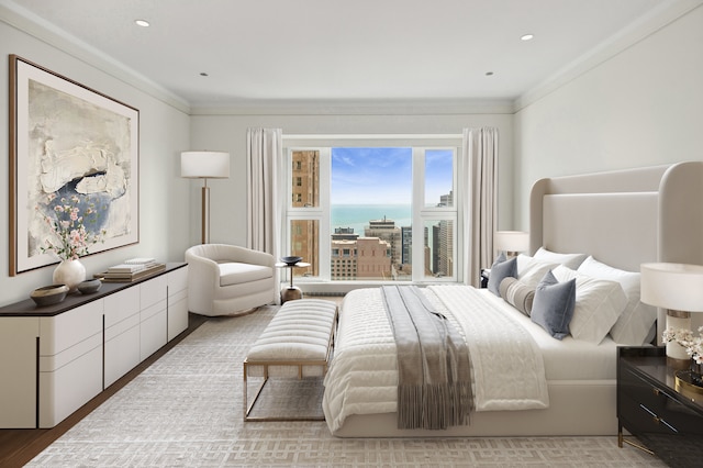 bedroom featuring light hardwood / wood-style flooring and ornamental molding