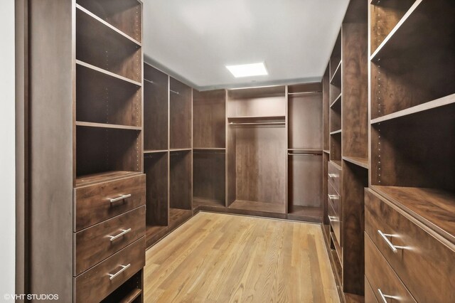 77 E Walton St Unit 28B, Chicago, IL 60611 - walk in closet with light wood-style flooring