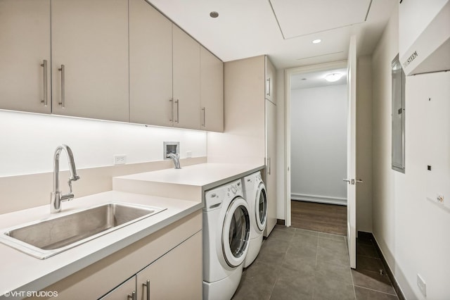 77 E Walton St Unit 28B, Chicago, IL 60611 - laundry area with washing machine and clothes dryer, cabinet space, dark tile patterned floors, recessed lighting, and baseboards