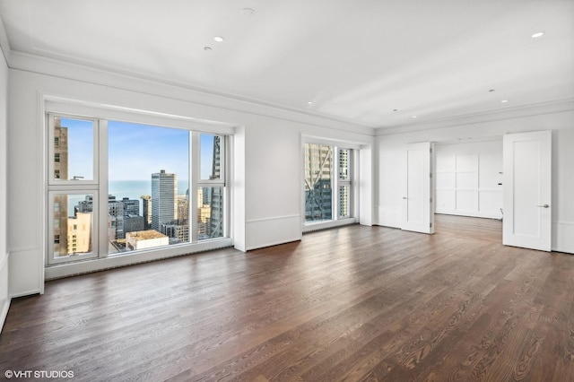 77 E Walton St Unit 28B, Chicago, IL 60611 - unfurnished living room featuring ornamental molding, dark wood-style flooring, and recessed lighting